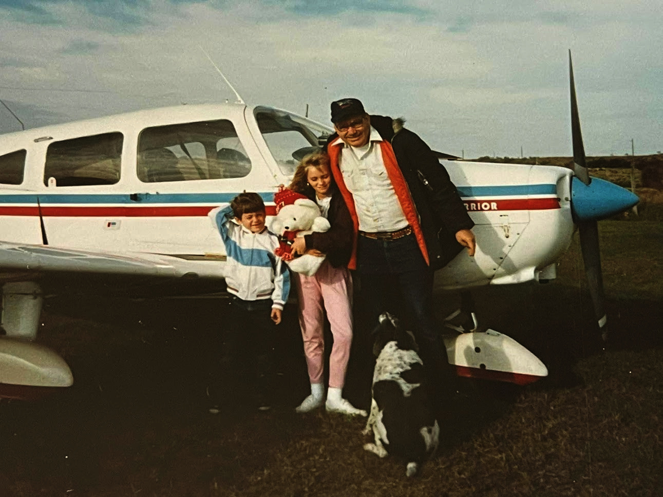 Young Grant Walker with his sister and grandparents' airplane
